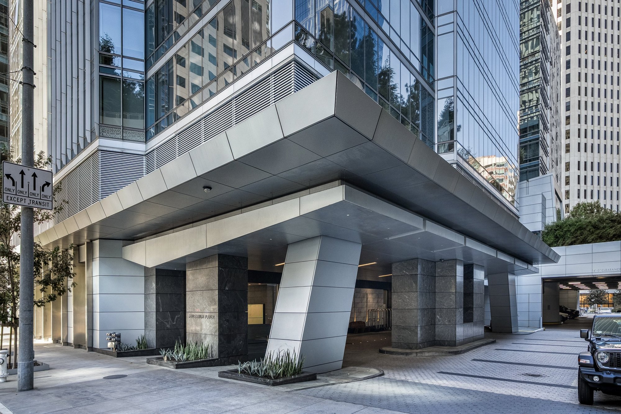 A high rise entry and covered drive by day, San Francisco. Real estate photography by Lumiful Media