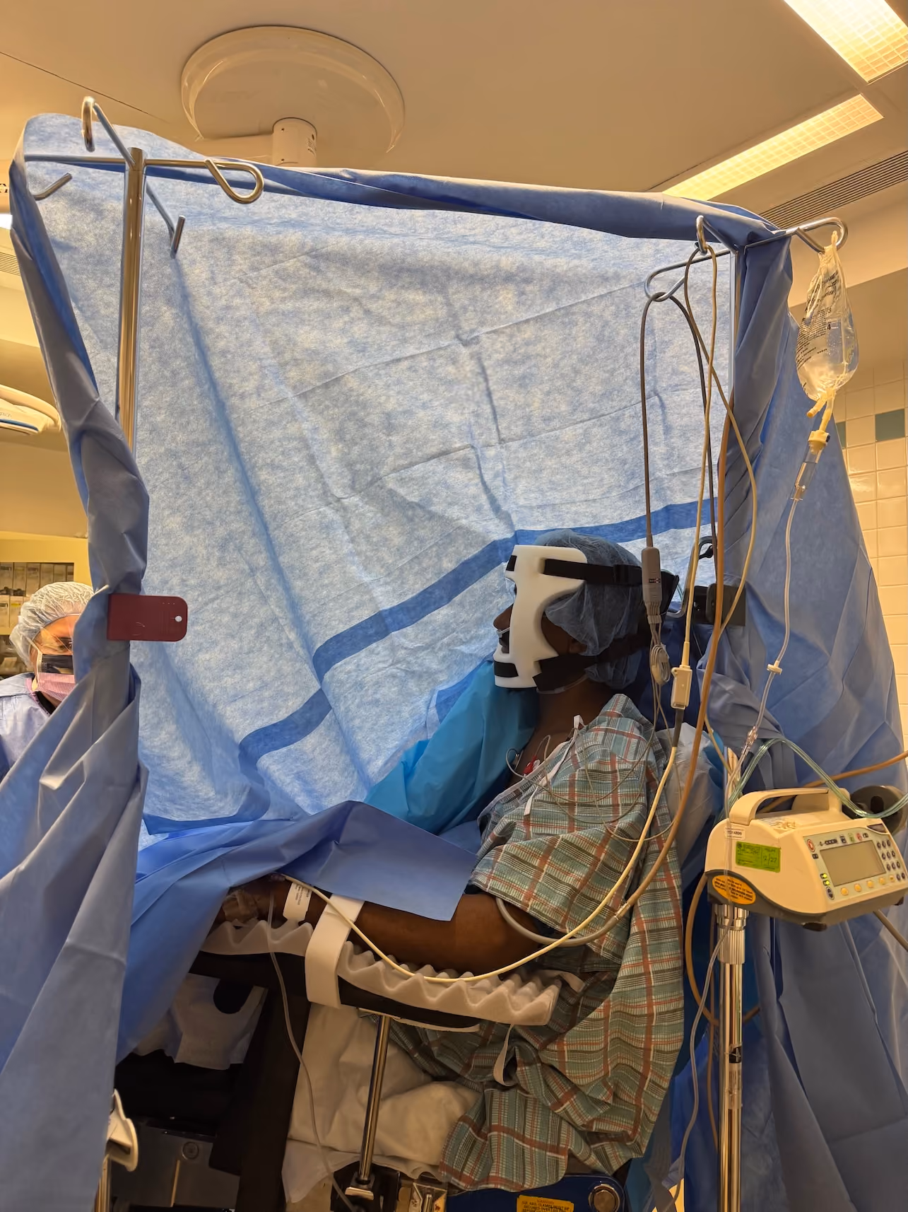 Draping tent and anesthesia equipment arranged for shoulder arthroscopy.
