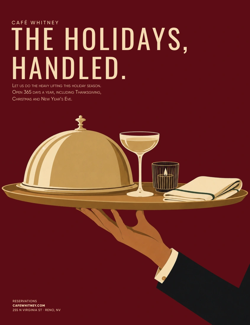 Burgundy Café Whitney holiday ad with a gold serving tray, cloche, coupe glass, candle and folded napkin supported by one hand.
