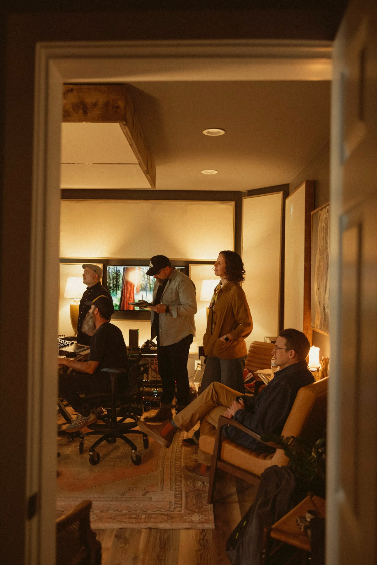 The band listening back in the studio