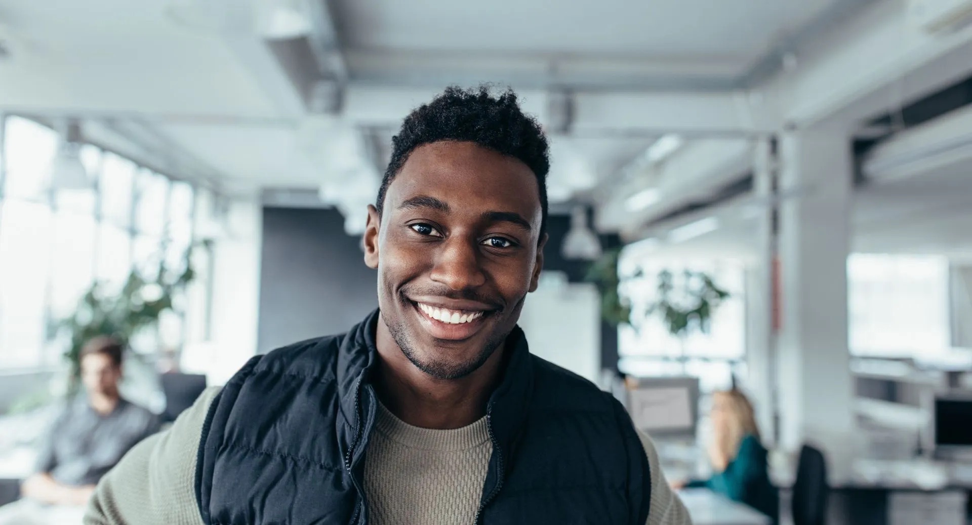 Smiling man in an office