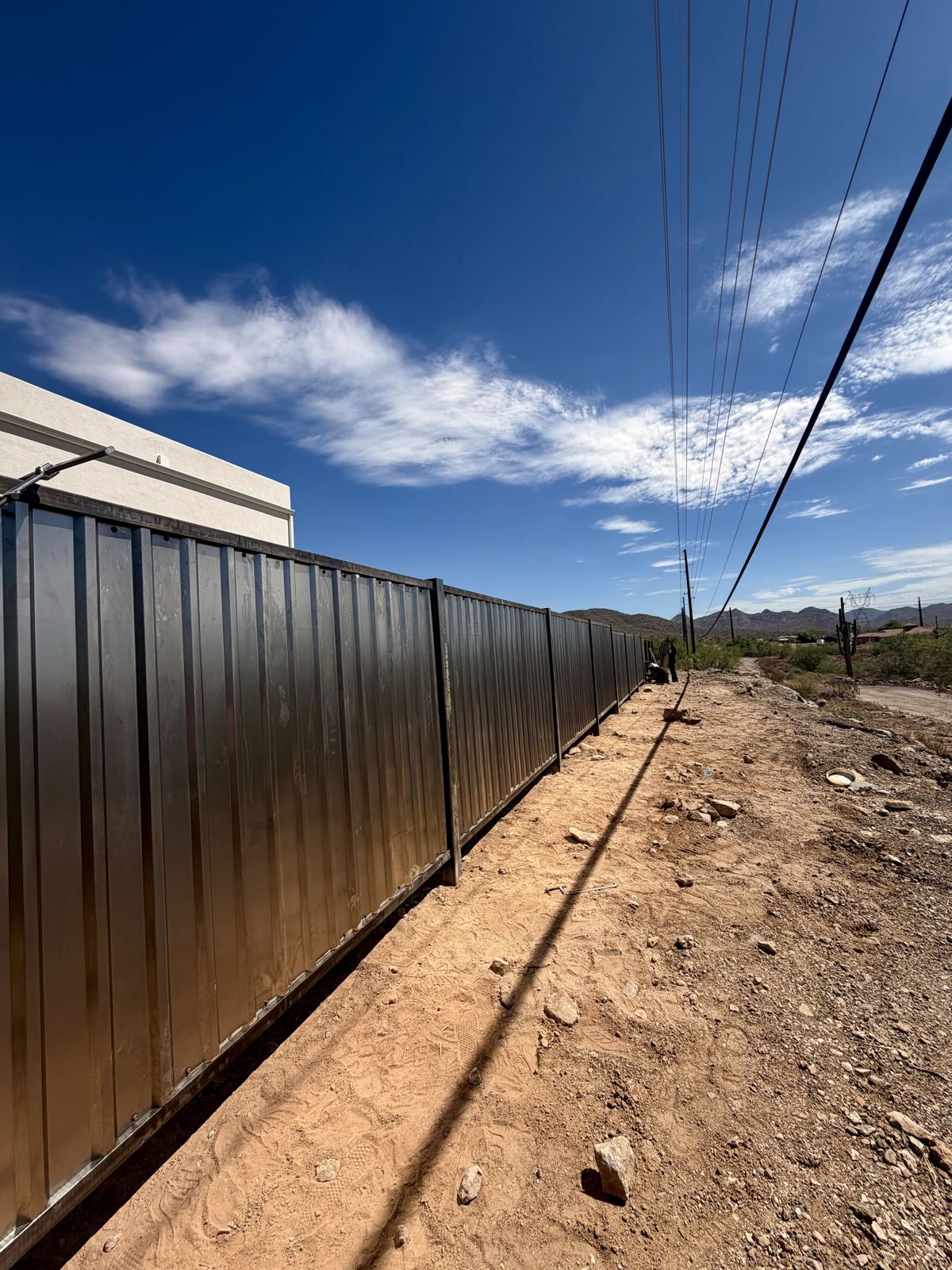 Corrugated steel privacy fence by Stein Steel