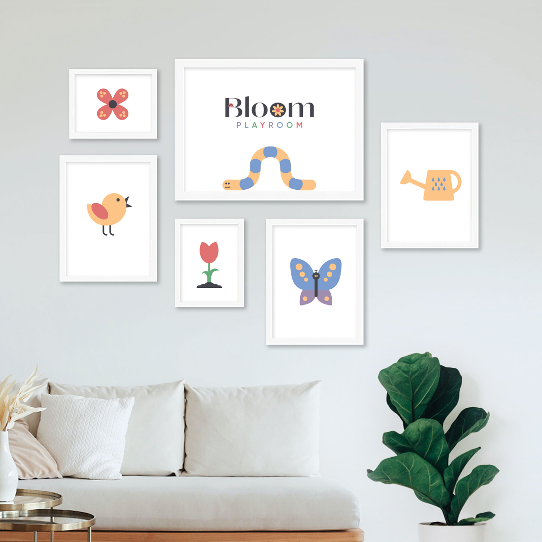 A room with contemporary furniture and designed graphics on the wall in Bloom Playroom branding.