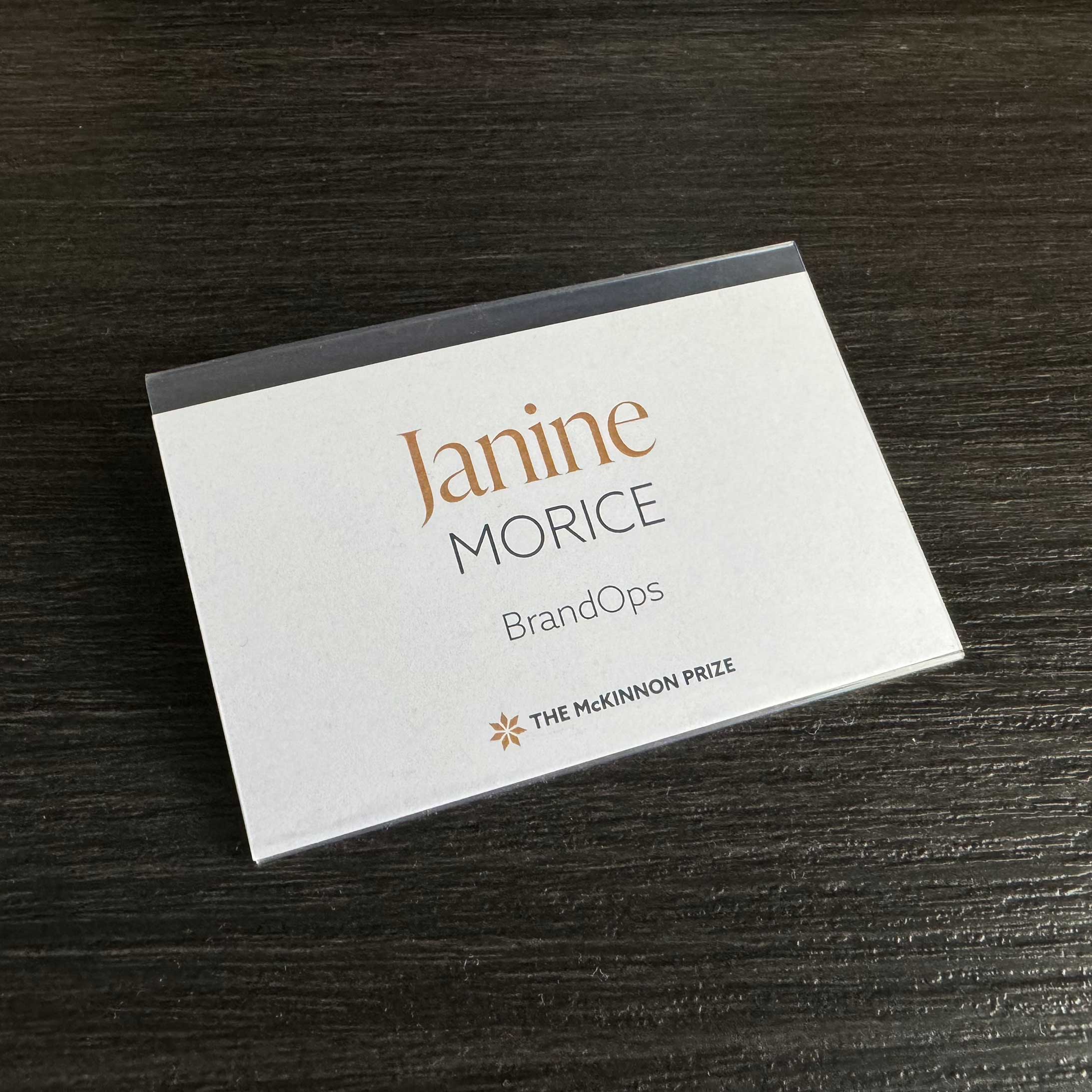 McKinnon Prize in Political Leadership name tag created using user experience design through visual design execution.