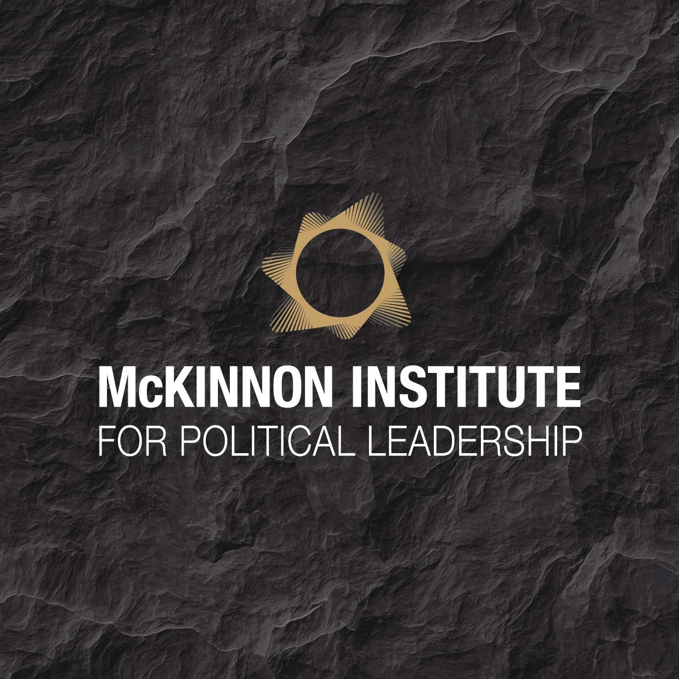 Crumpled black paper with the McKinnon Institute logo on top