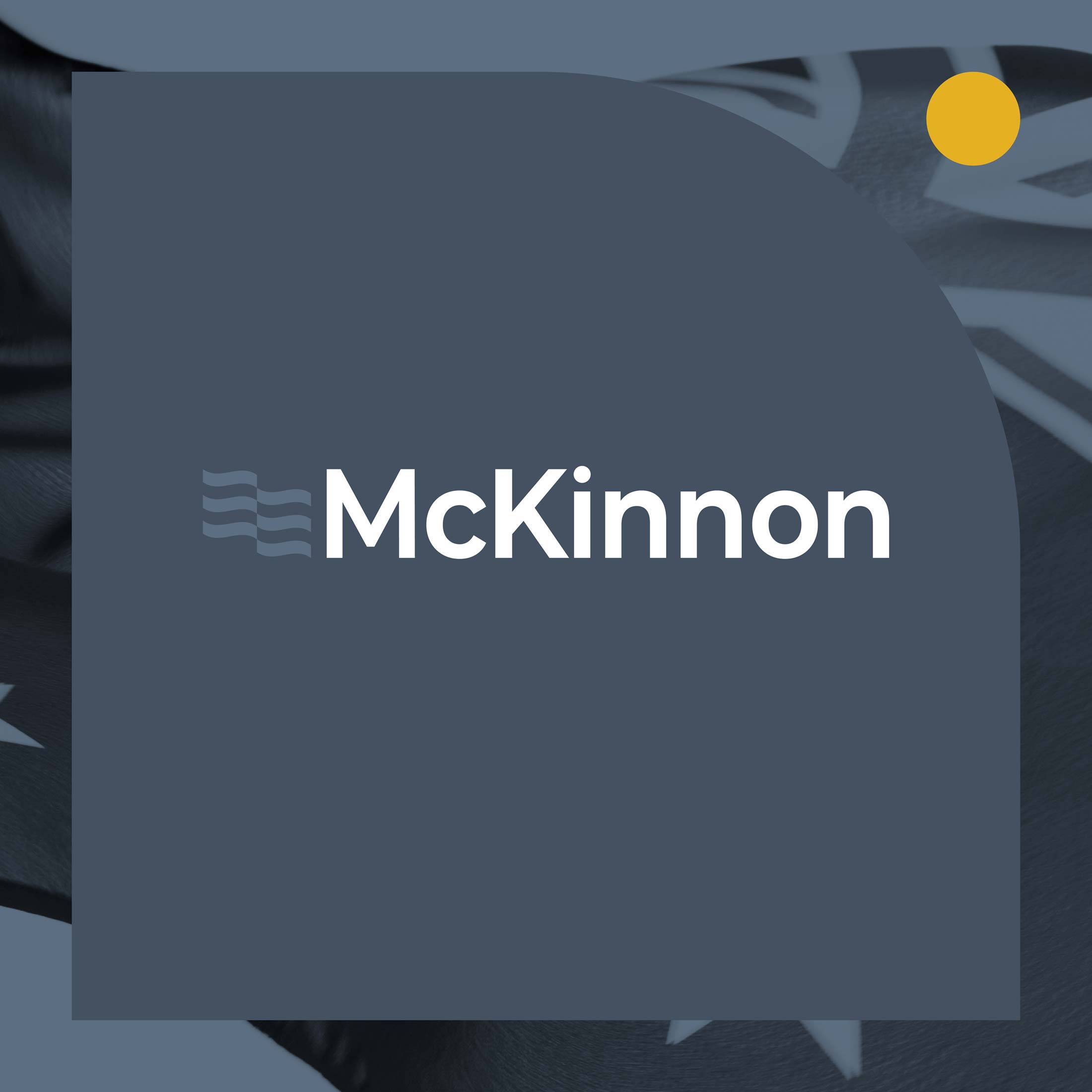 McKinnon logo on blue background with geometric shape then flag image behind that. Yellow dot in top right corner