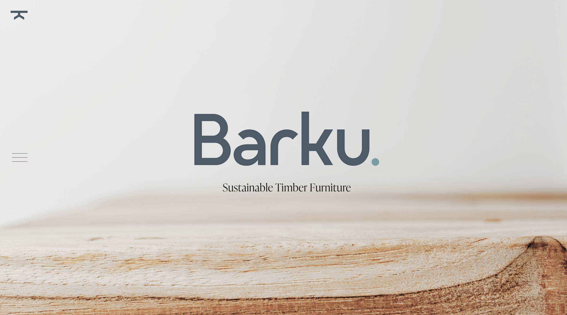 Barku website homepage with unfinished wood and the logo as the feature