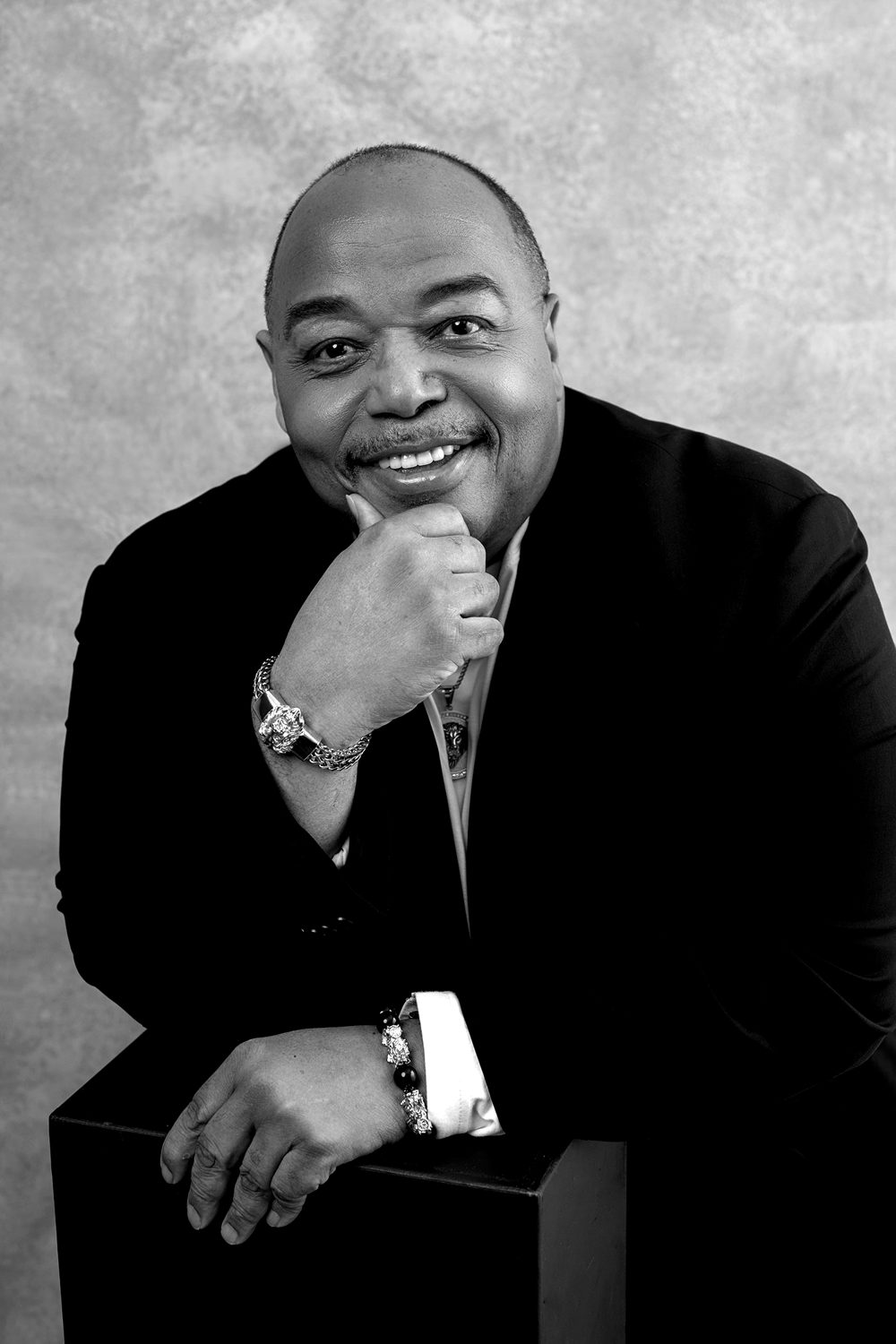 Black and white portrait of Charles K Davis, hand on chin