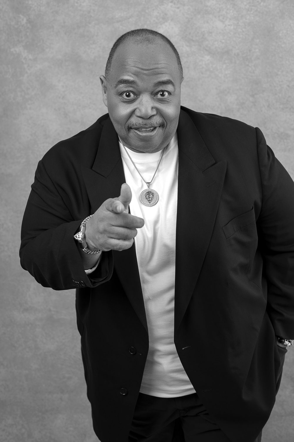 Black and white portrait of Charles K Davis pointing toward the camera