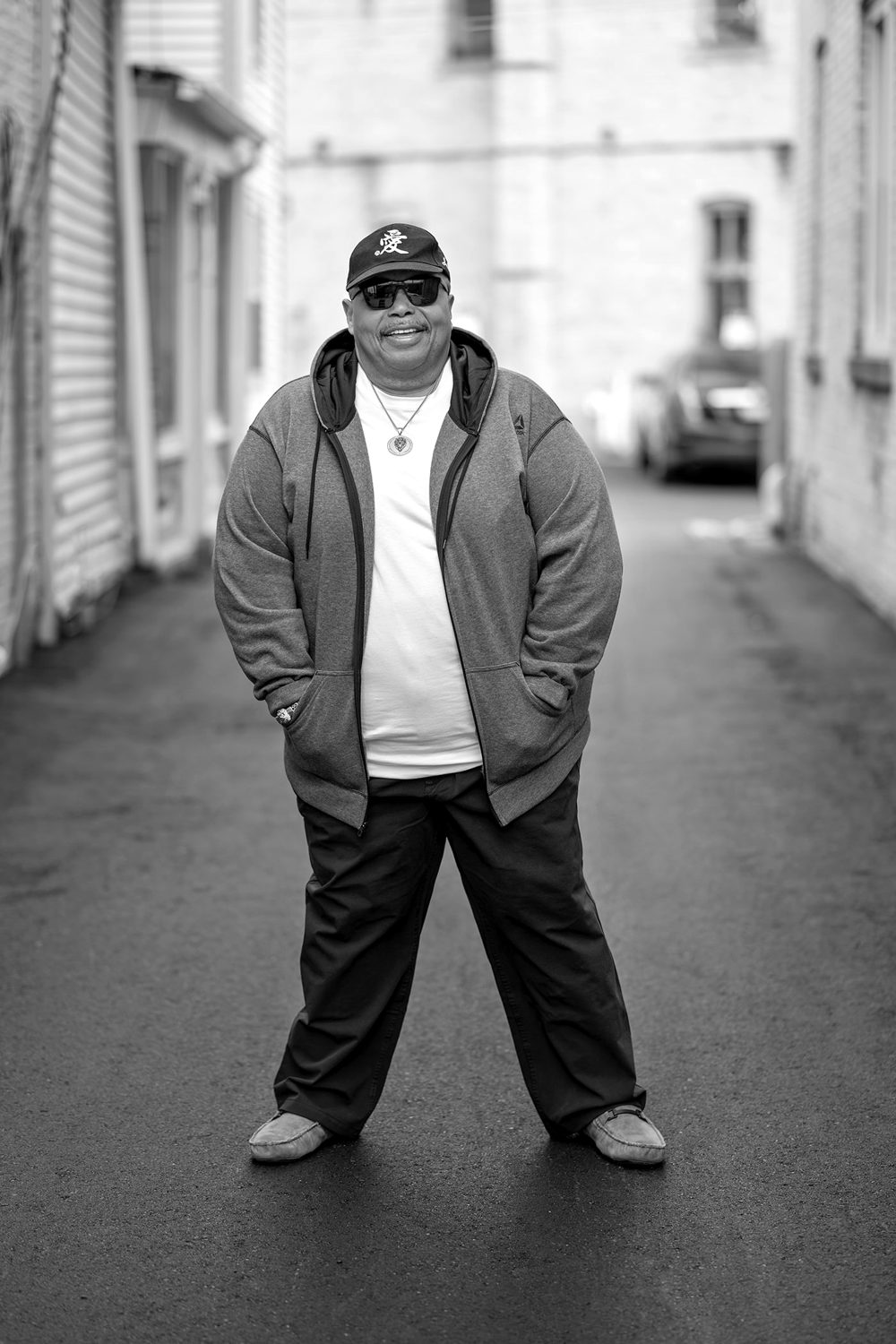 Black and white photo of Charles K Davis standing in a street