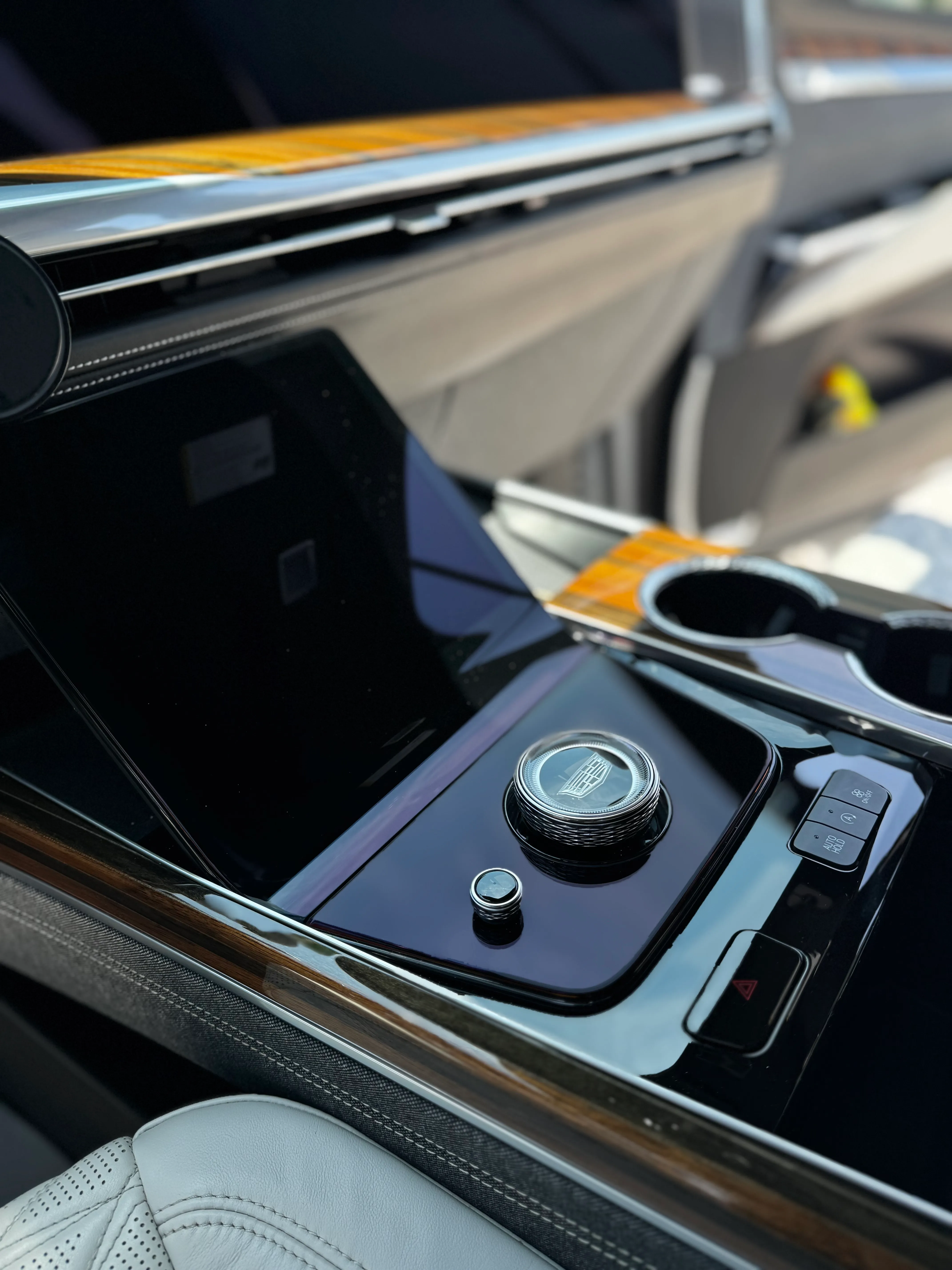Glossy center console and trim after an interior detail