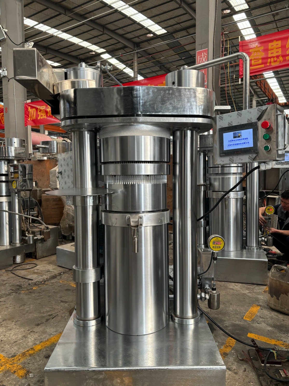 Oil press in the factory workshop