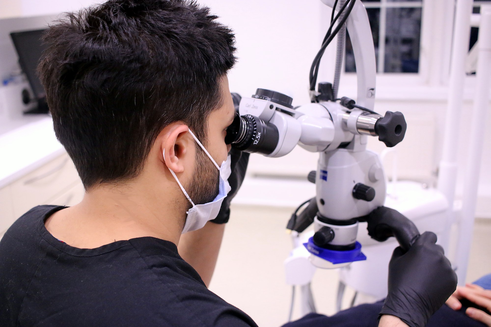 Dr Amit Patel at the Zeiss operating microscope