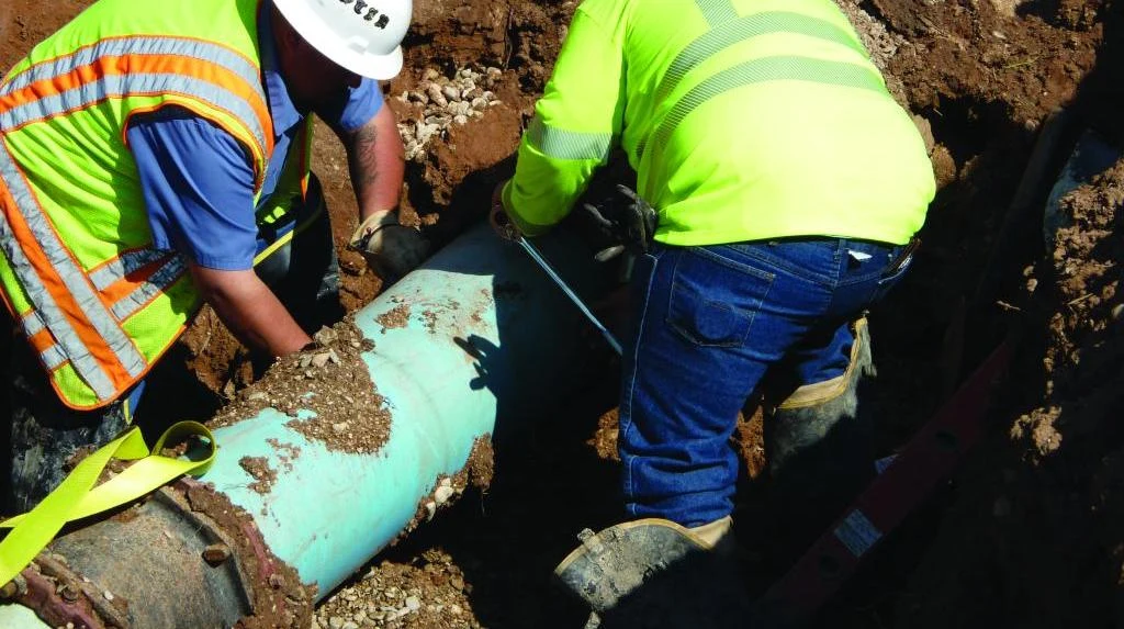 Crews working on water utility construction
