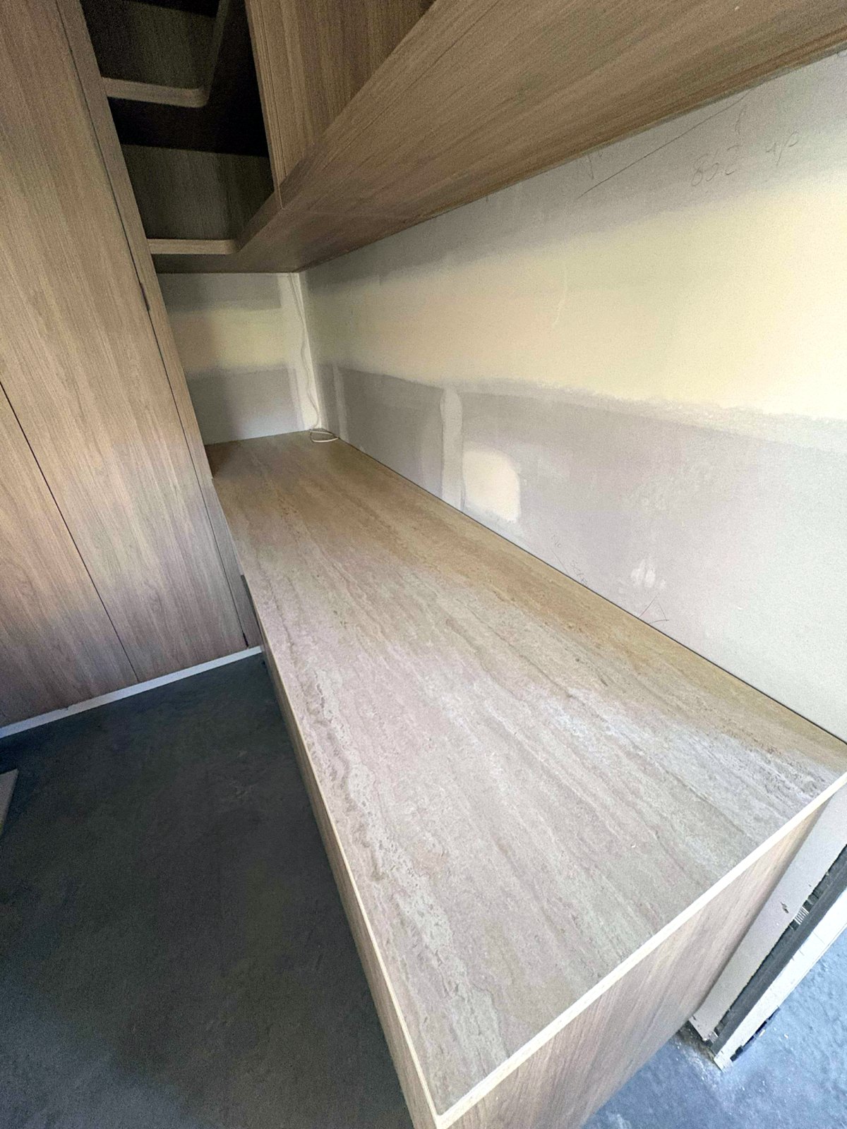 Long sintered travertine benchtop run