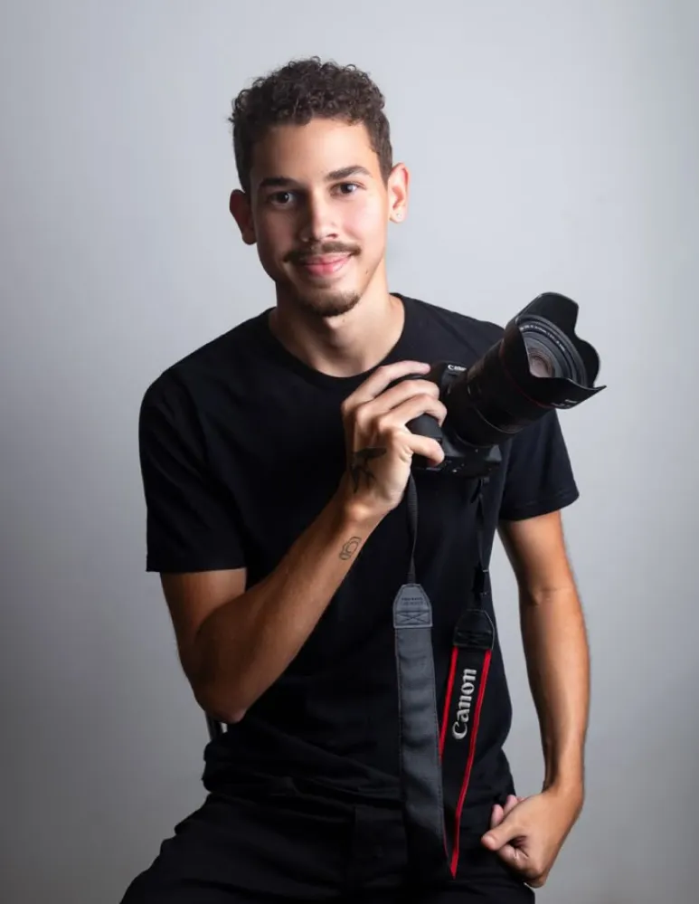 Wedding photographer portrait with camera