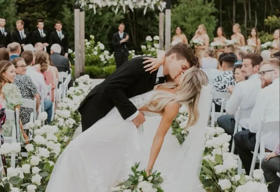 Bride with flowers in a garden