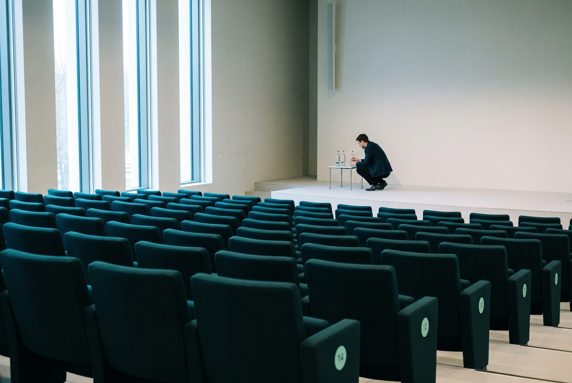 Empty auditorium being prepared before a session