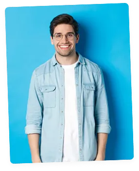 Profile photo of Taylor, a smiling man in a denim shirt