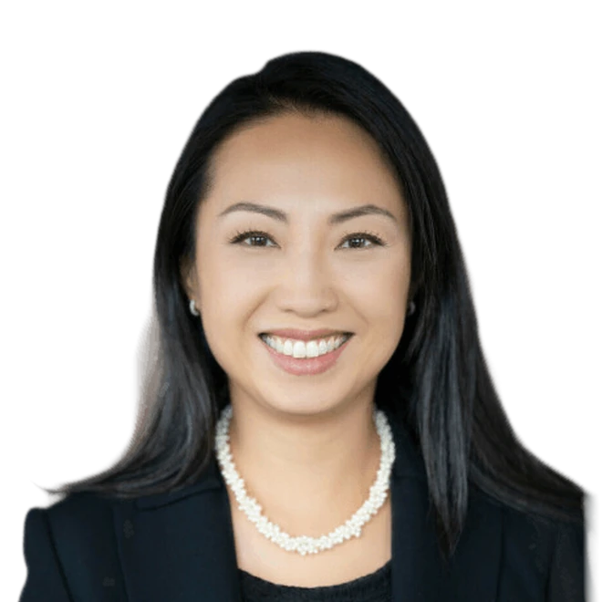 So Hui Nye of Ascendesign smiling in a black blazer and pearl necklace