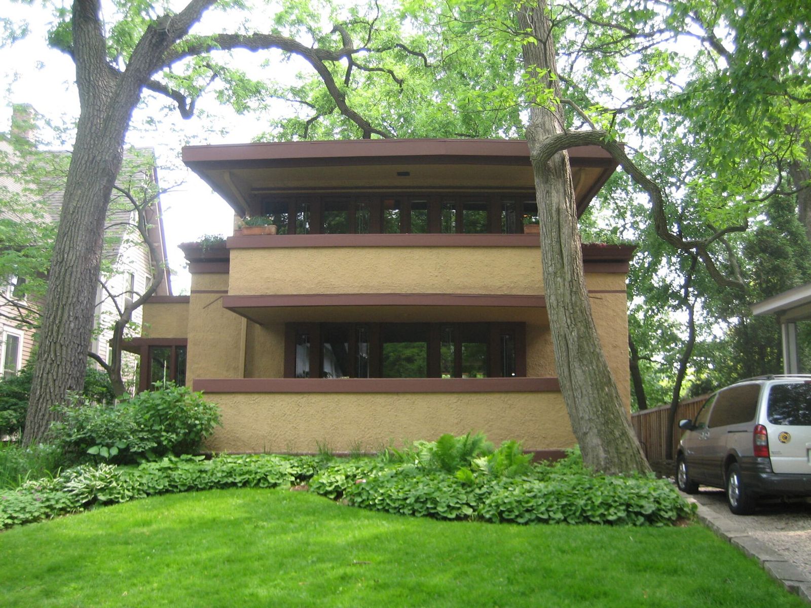 Frank Lloyd Wright's Prairie School Mrs. Thomas Gale House among trees in Oak Park, Illinois