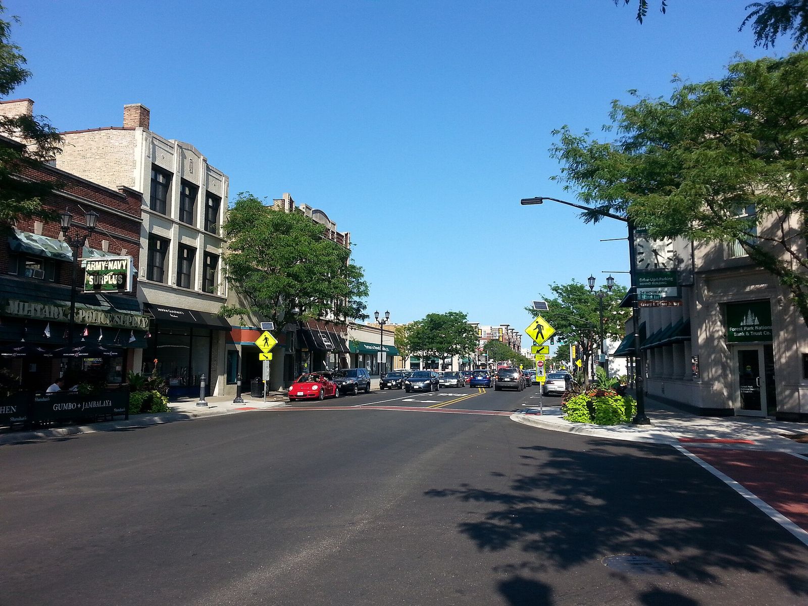 Shops and street trees along Madison Street in Forest Park, Illinois