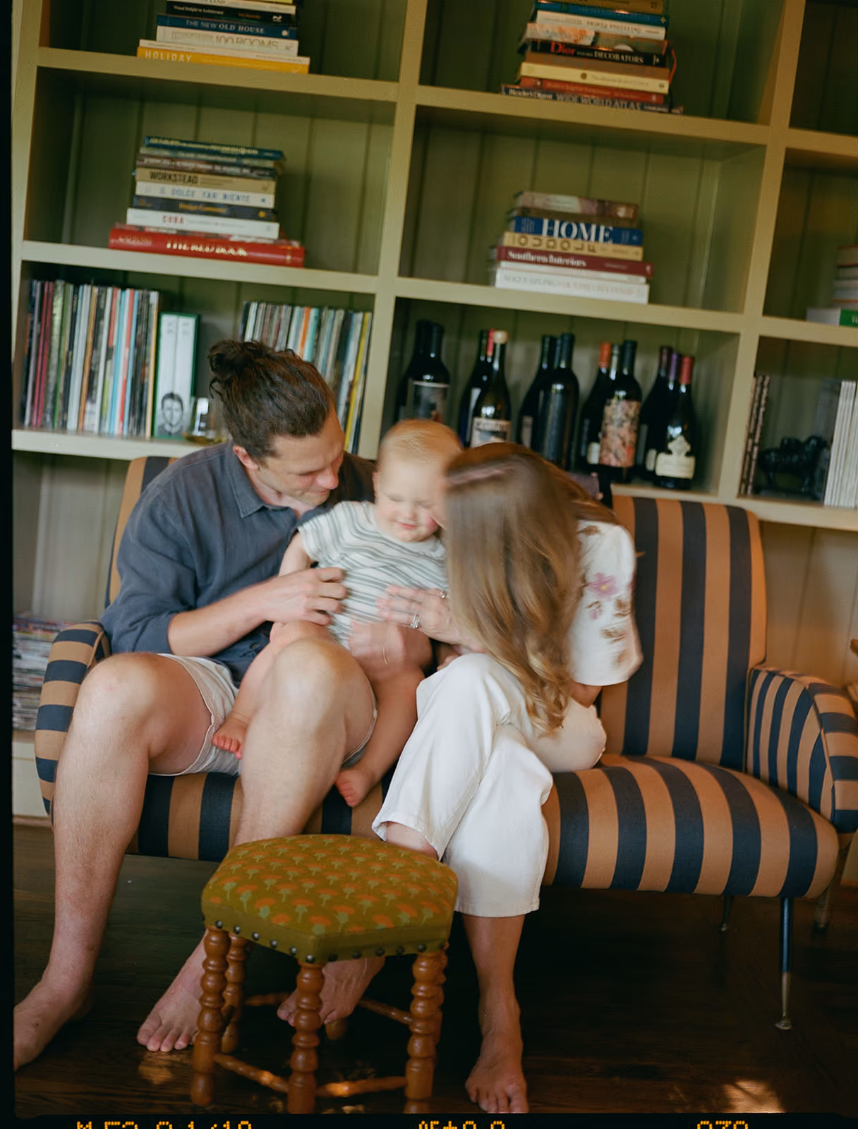 Dylan and Sarah Spencer at home with their baby boy
