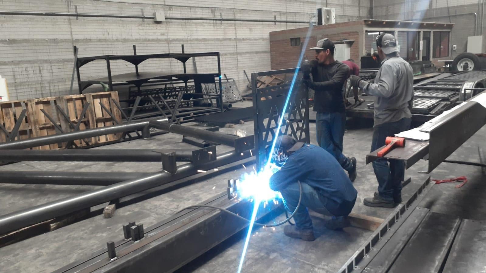 Welding the steel frame in the workshop