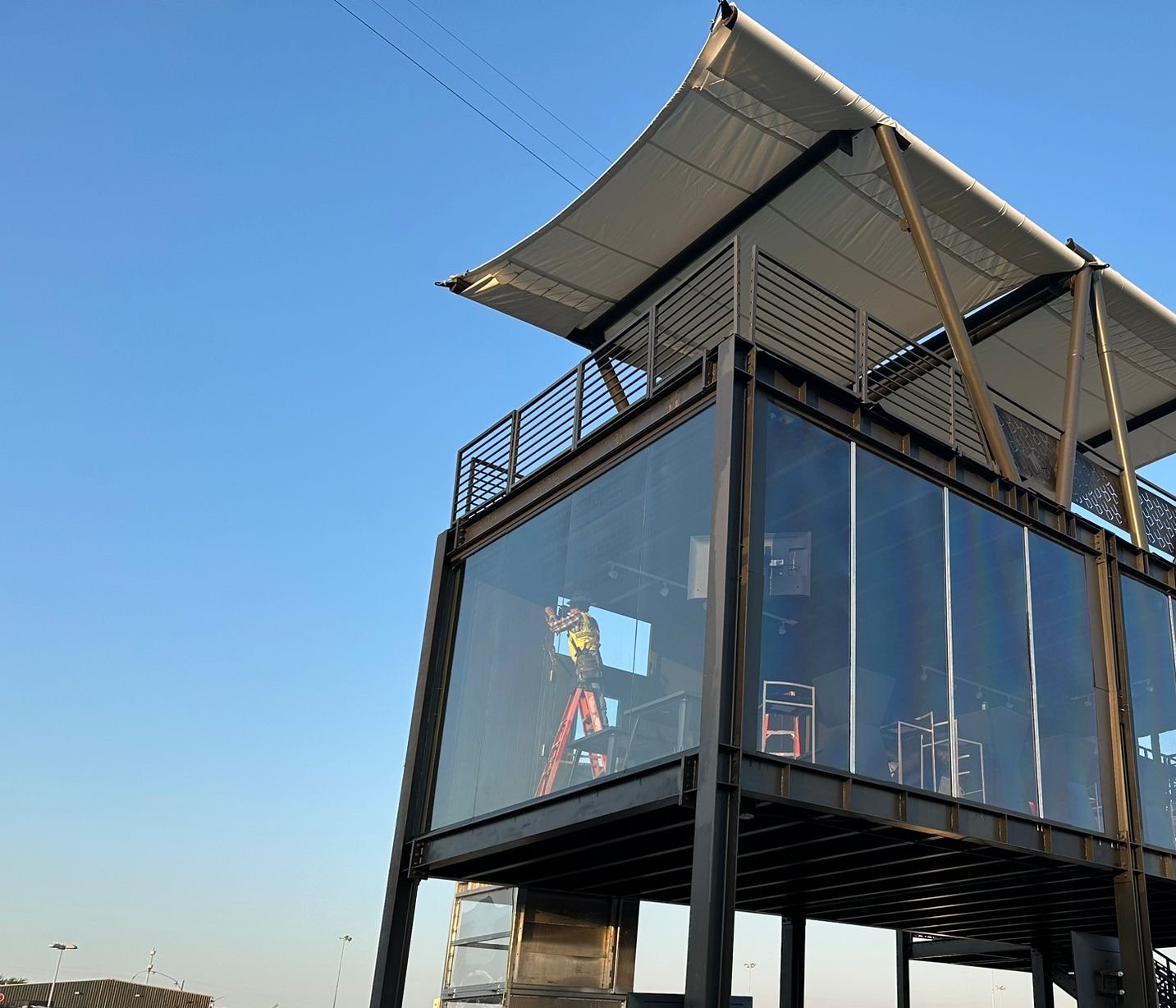 The glazed hospitality module and its canopy seen from below