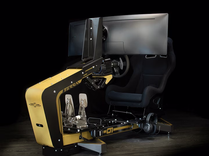 The gold ImSim TERRA Tacto simulator, seen from the front at three-quarters.