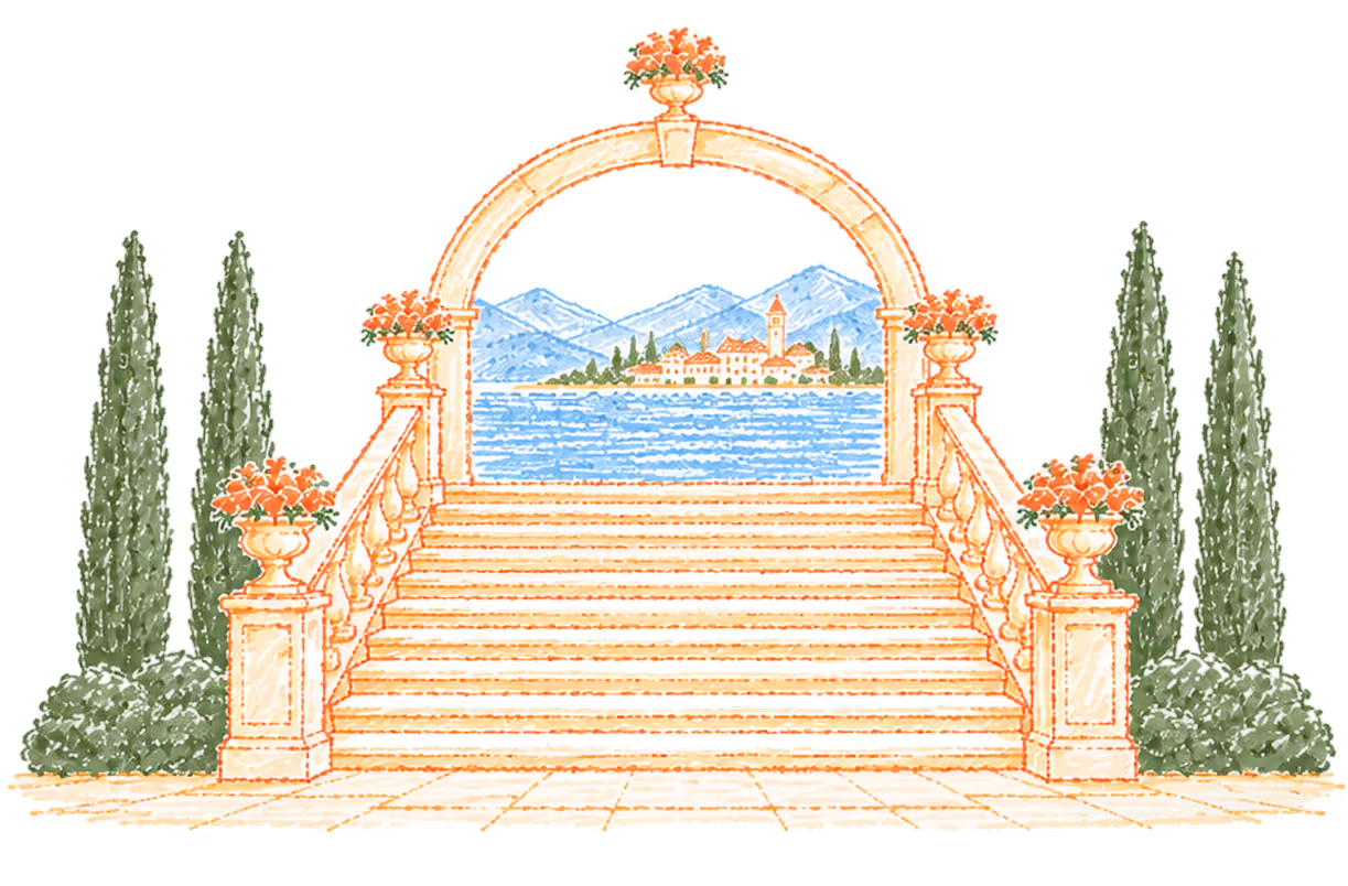 Stone staircase with balustrades leading to an arched frame decorated with flower pots, showing a scenic view of a coastal village with mountains and water in the background, flanked by tall evergreen trees and shrubs.