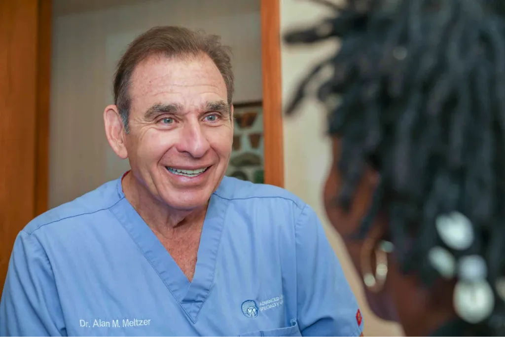 Doctor consulting with a patient during implant evaluation