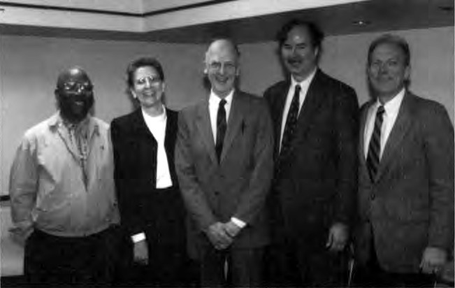 Ed Nestingen (center) at the Edward L. Nestingen Symposium held for his retirement in the fall of 1991, with panel members Joseph Smith and Sylvia Ronsvalle (left), speaker Philip Martin and Executive Director John Jordan (right). From Scott J. Peters, The Promise of Association (1997).