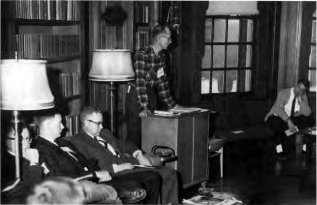 Ed Nestingen (standing) at a Y retreat at Allerton House, 1961. From Scott J. Peters, The Promise of Association (1997).