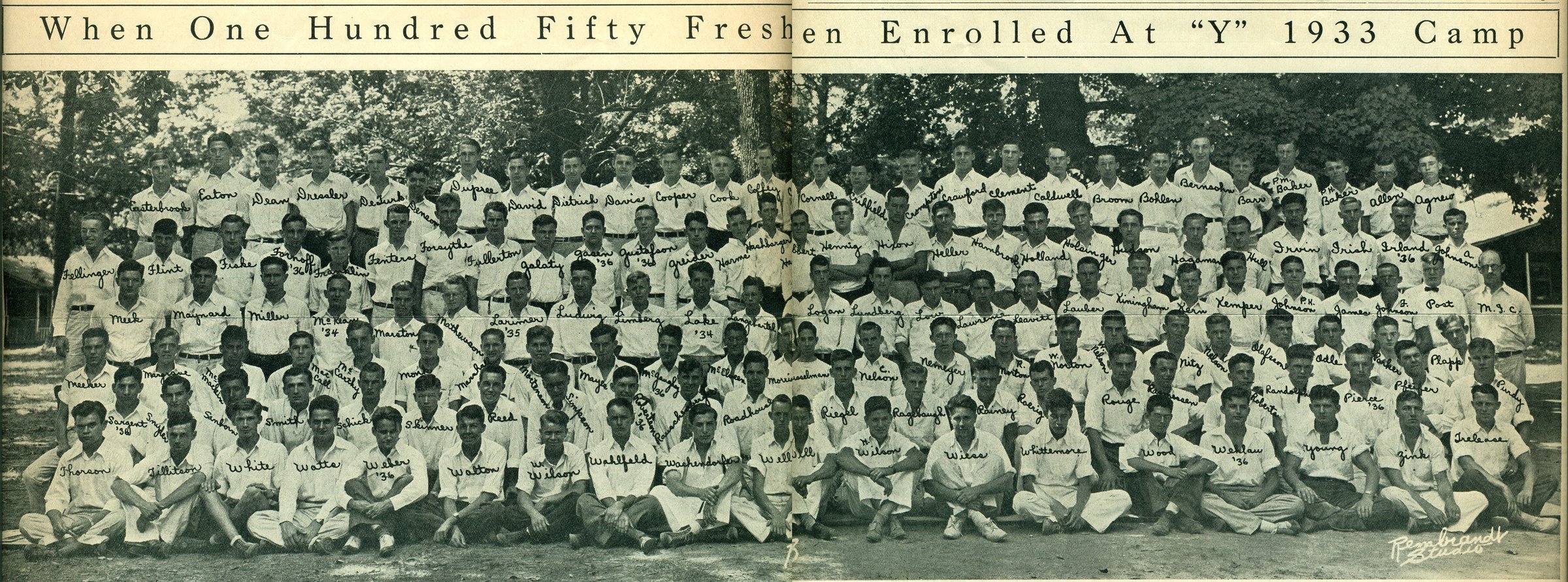 "When One Hundred Fifty Freshmen Enrolled at 'Y' 1933 Camp": the University YMCA's Freshman Camp in the fall of 1933, with the campers' and leaders' names written on the print. Upperclass leaders are marked with their class years, among them Jim Lake '34, the Y's president that year. The man at far right is marked "M.I.C.," probably Mic Coldwell. From The Y's Indian, October 1933.