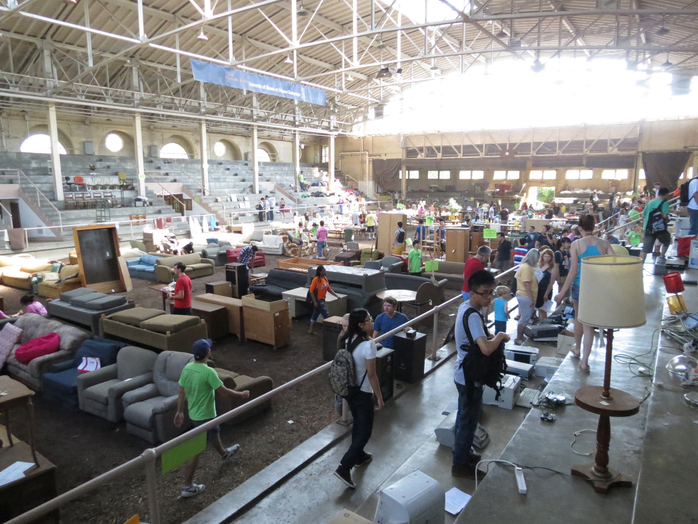Shoppers on the floor of the U of I Stock Pavilion on the first morning of the Big Sale, Aug. 25, 2012.