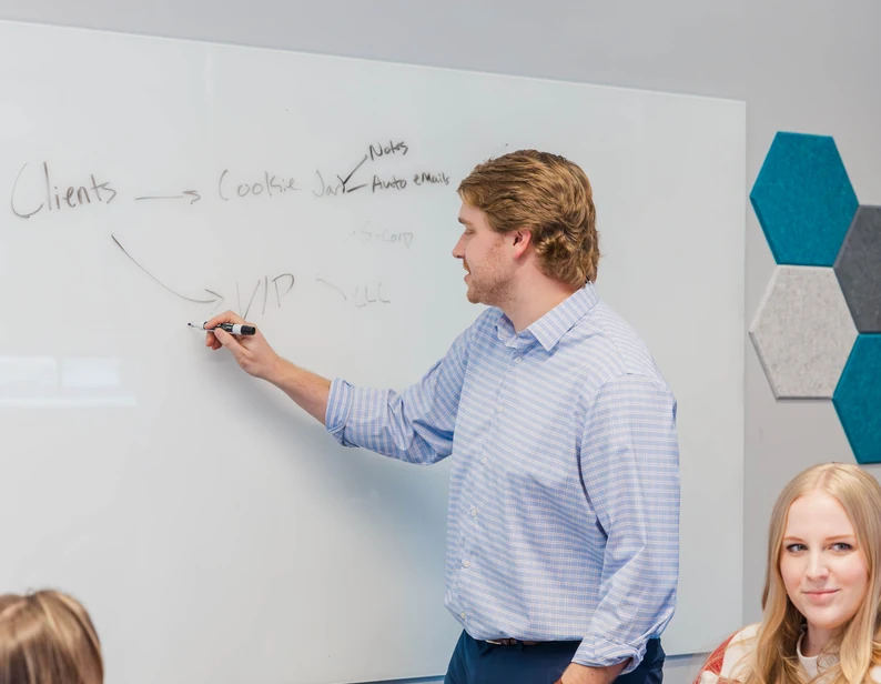 Team members collaborating in the Cookie Finance office