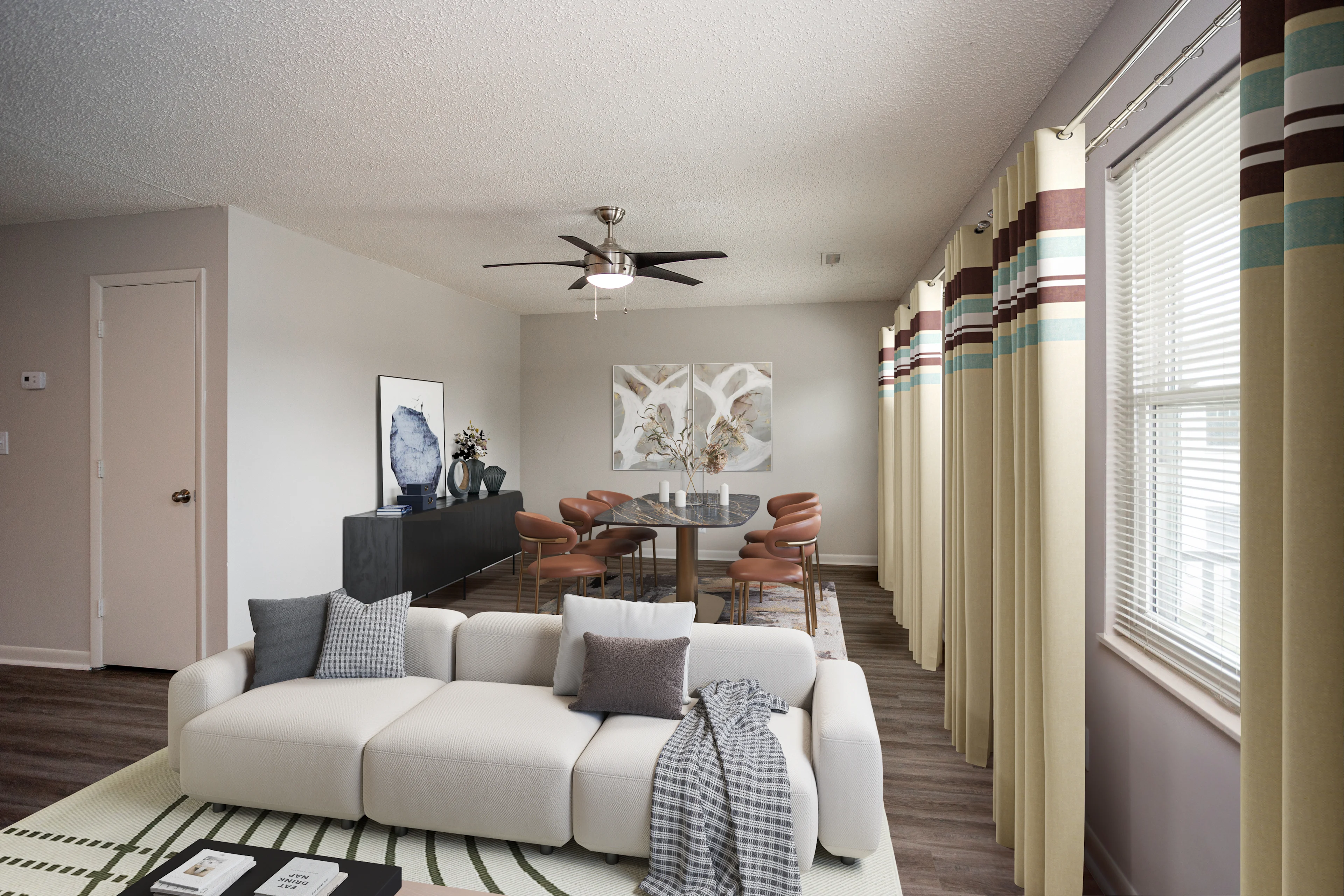 Furnished dining room and living room