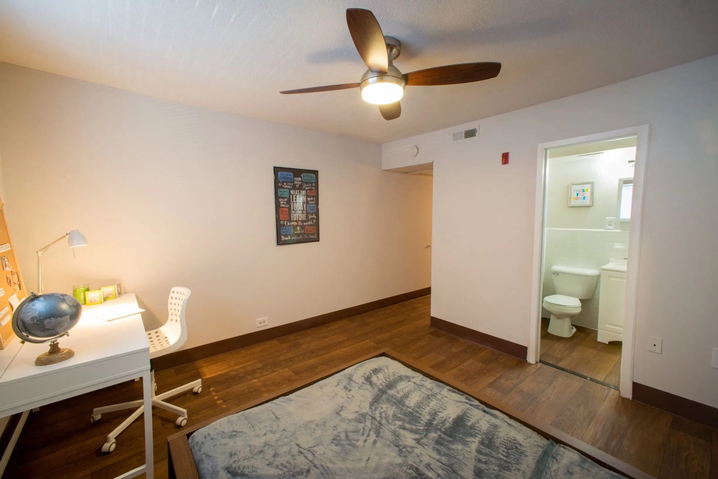 Bedroom with desk and bathroom
