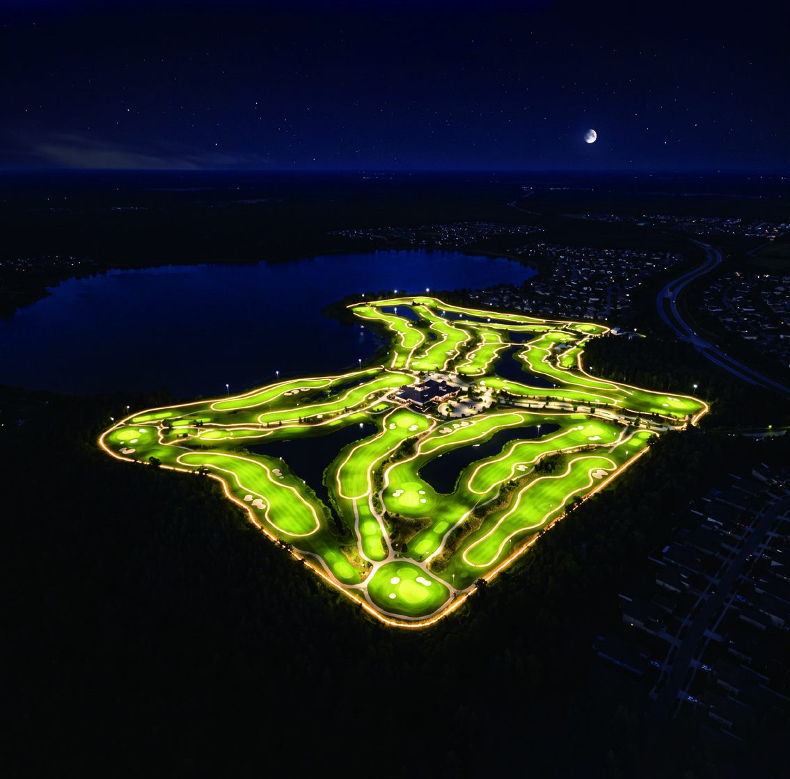 Island golf course fully lit at night