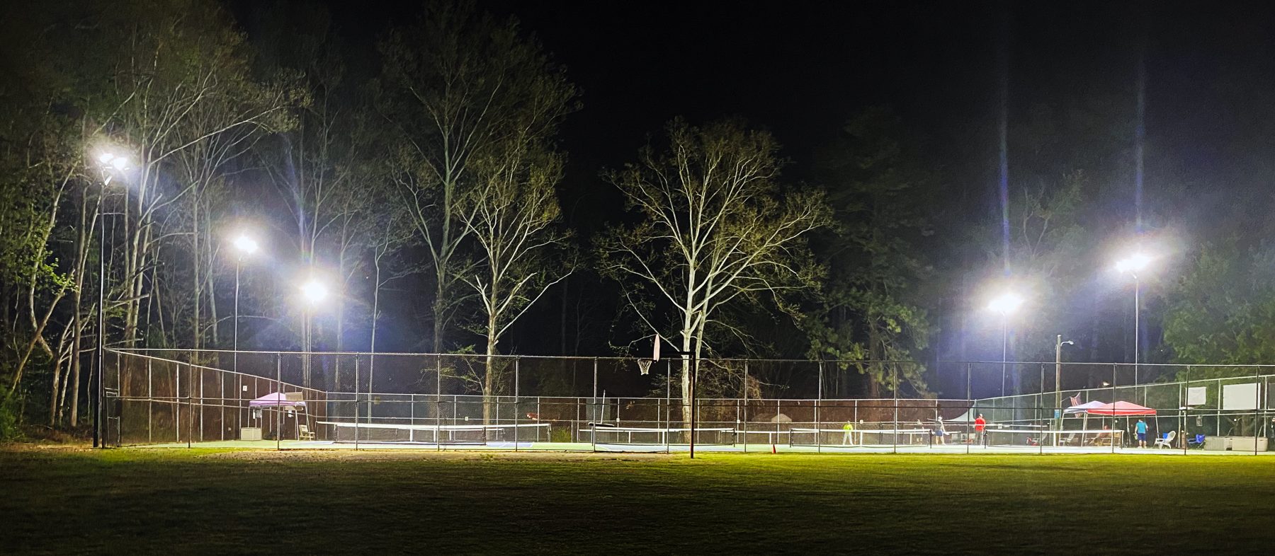 Montclair pickleball courts lit at night