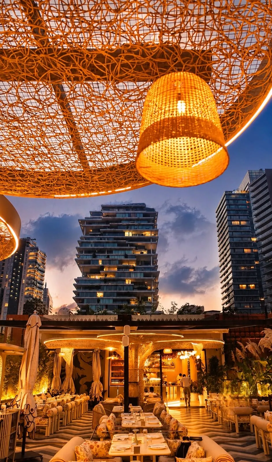 Skoya rooftop at sunset under the woven canopy