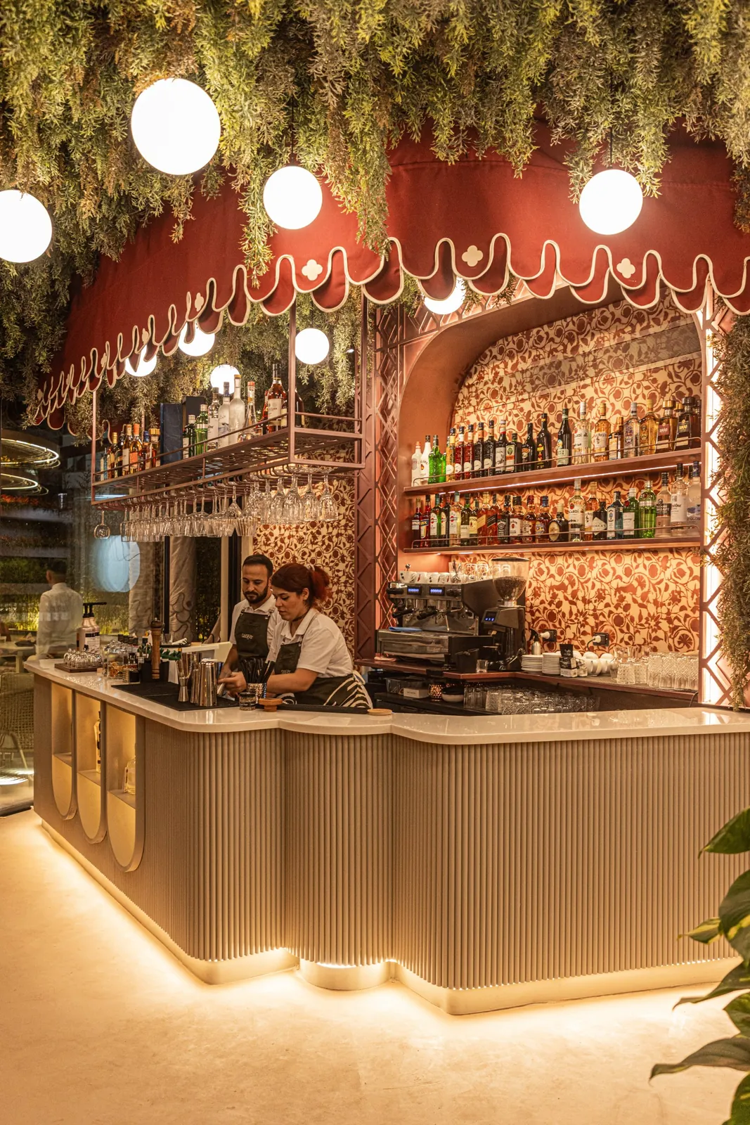 The Skoya bar under its scalloped red awning