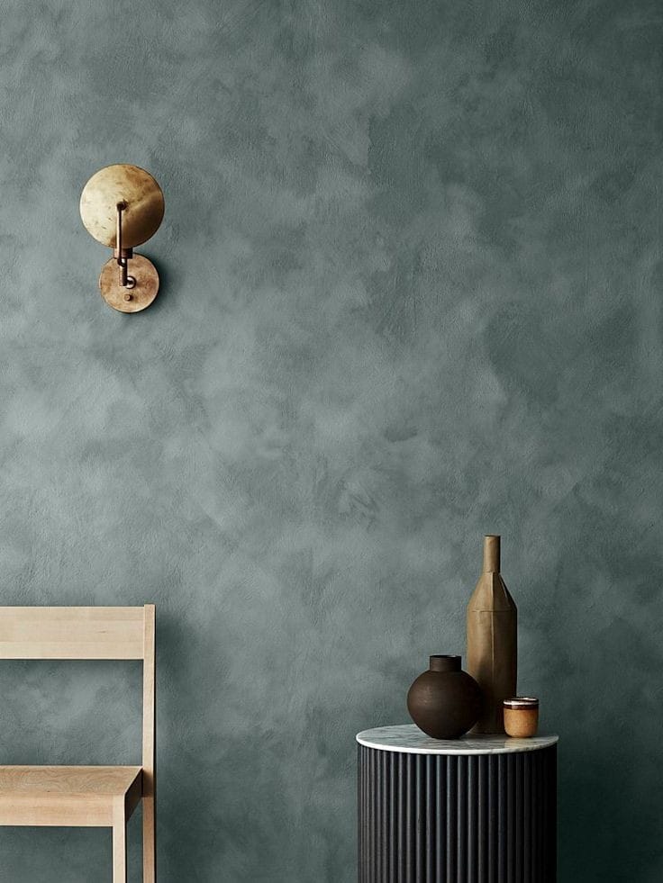 Decorative wall finish behind a bathroom basin
