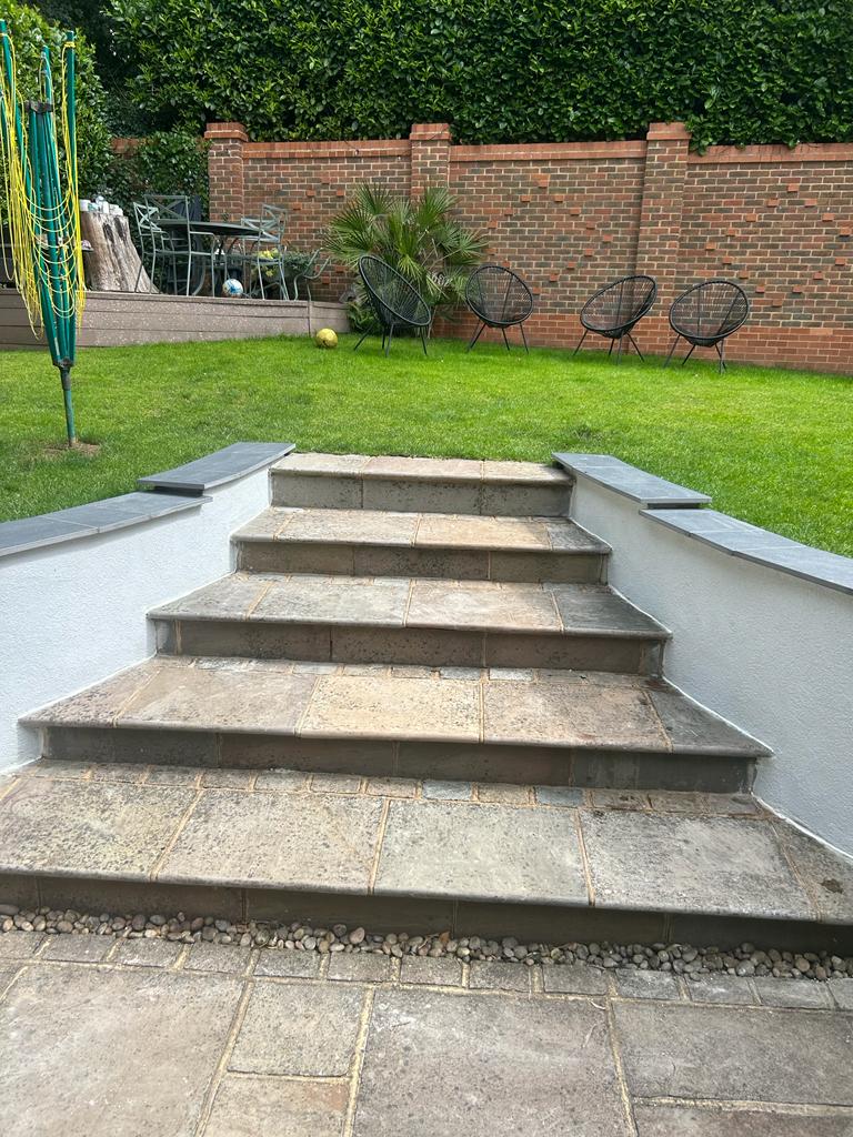 Garden steps leading to a landscaped outdoor area