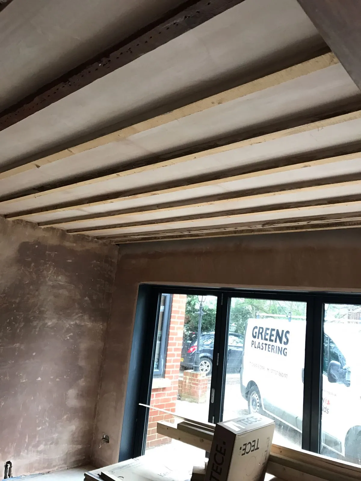 Interior ceiling with exposed wooden slats