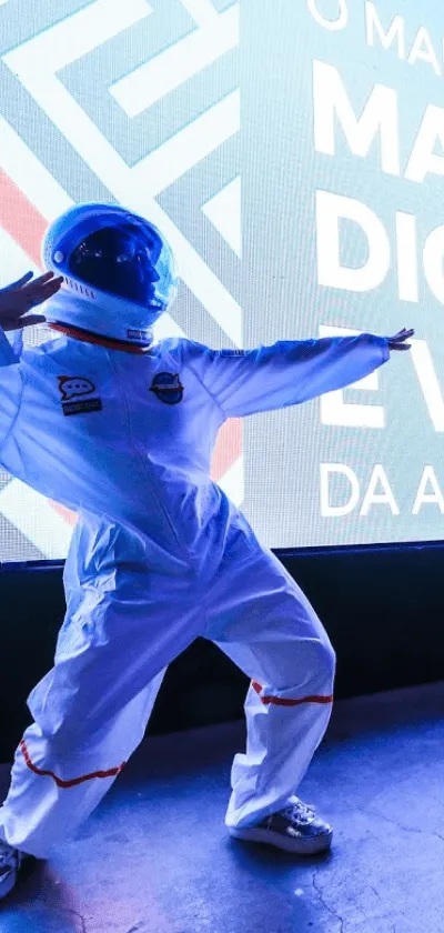 Person in a white astronaut suit and helmet posing dynamically in front of a brightly lit background with partially visible large text.