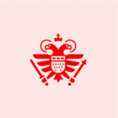 Red heraldic eagle emblem with a crown, shield, sword, and scepter on a light pink background.