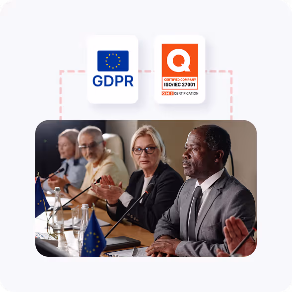 Group of professionals in a meeting with European Union flags on the table, showing GDPR and ISO/IEC 27001 certification icons above.