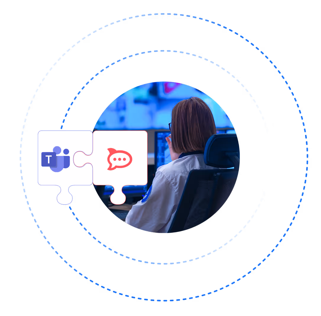 Person sitting in an office chair in front of multiple computer monitors with two puzzle pieces showing Microsoft Teams and chat icons.
